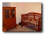 The crib and armoire.